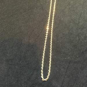 Guld halsband 18k längd 60cm bredd 0.4 vikt 14g