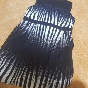 Klänning  - Oanvänd klänning i storlek L fint skick 