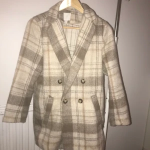 Rutig kappa - Rutig kappa från hm. Använd men i bra skick! 