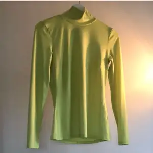 Neon green / yellow turtleneck top from NLY Trend size S. Super soft material, best color representation on last photo