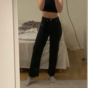 Svarta vida byxor  - Använda en gång, stretchmaterial 