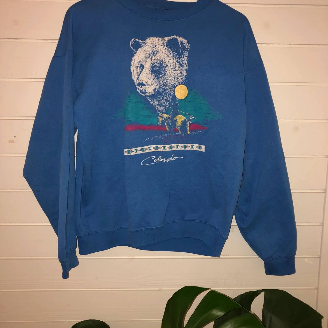 Blå retro collegetröja