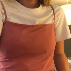 Rosa Linne - Säljer detta söta Rosa linnet från H&M, aldrig använt! Det är i storlek L men passar lite oversized på min som vanligtvis har storlek S