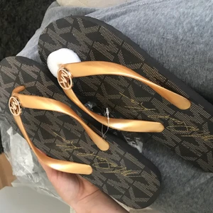 Michael kors tofflor  - Tofflor Michael kors strl 38