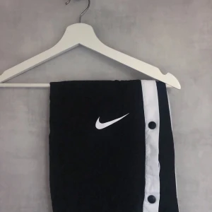 Nike popper pants - -