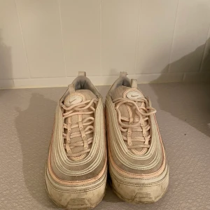 Nike Air Max 97 - Very Cute Nike Pinkish shoes that go with everything. 