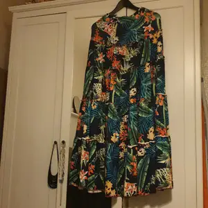 Its a beautiful floral skirt with a half top. It fits great for summer. I have only won it once so it is still in its good condition as new. free size for small and medium.