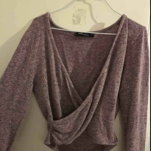  - Rosa söt tröja från new yorker. Mjuk och mysig. Låg cleavage 