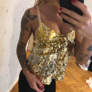  - Paljettlinne i storlek xs, oanvänt 