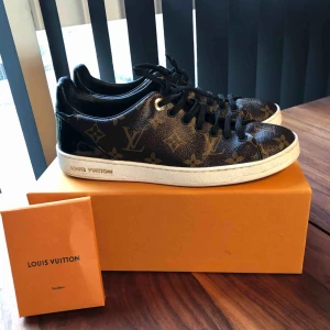  - Louis Vuitton sneakers 37.5.  With boks :) 