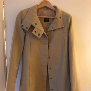  - Beige Trench brand new never worn.