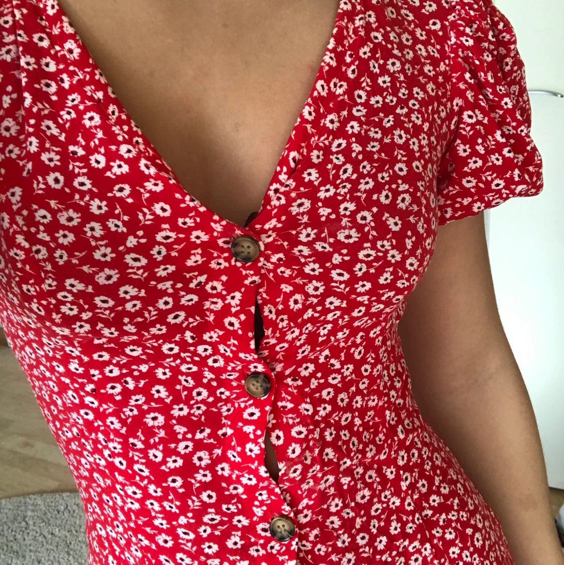 Blommig klänning storlek 34 - 90