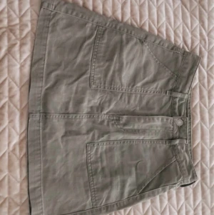 Jeanskjol från HM - Grön jeanskjol från HM