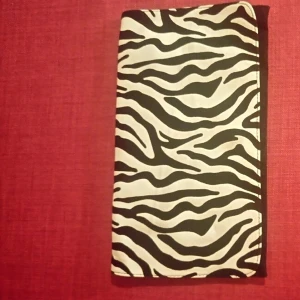  - clutch bag, zebra stripped.