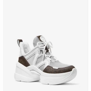  - Michael Kors Olympia nylon and logo Trainer Nya oanvända  Köpta för 2000kr Ses i Sthlm annars tillkommer frakt. 