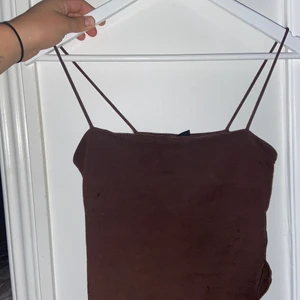 Mörk lila topp - Mörk lila topp, inte kommit till användning +frakr