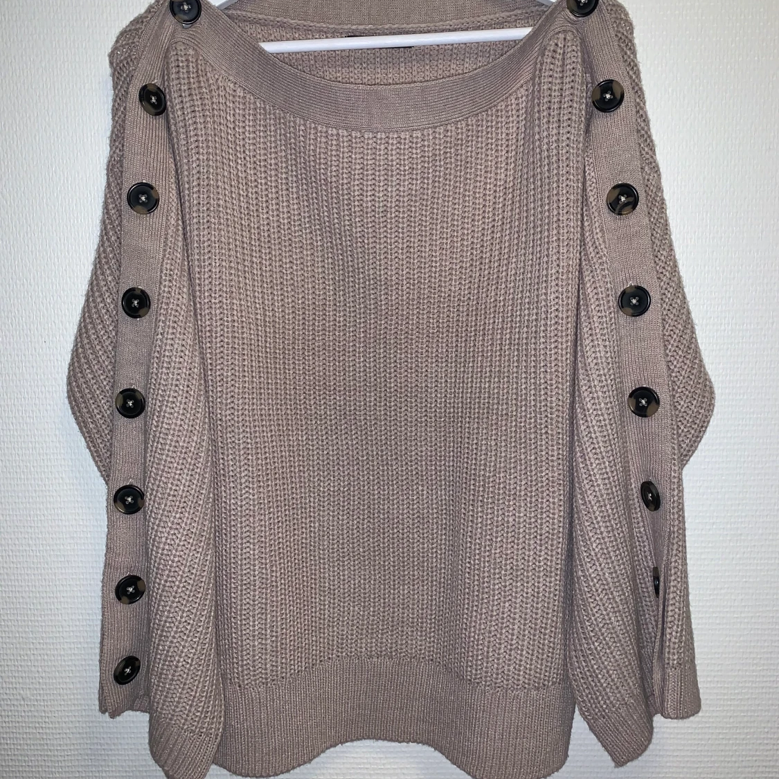 Stickad tröja. Storlek S/M