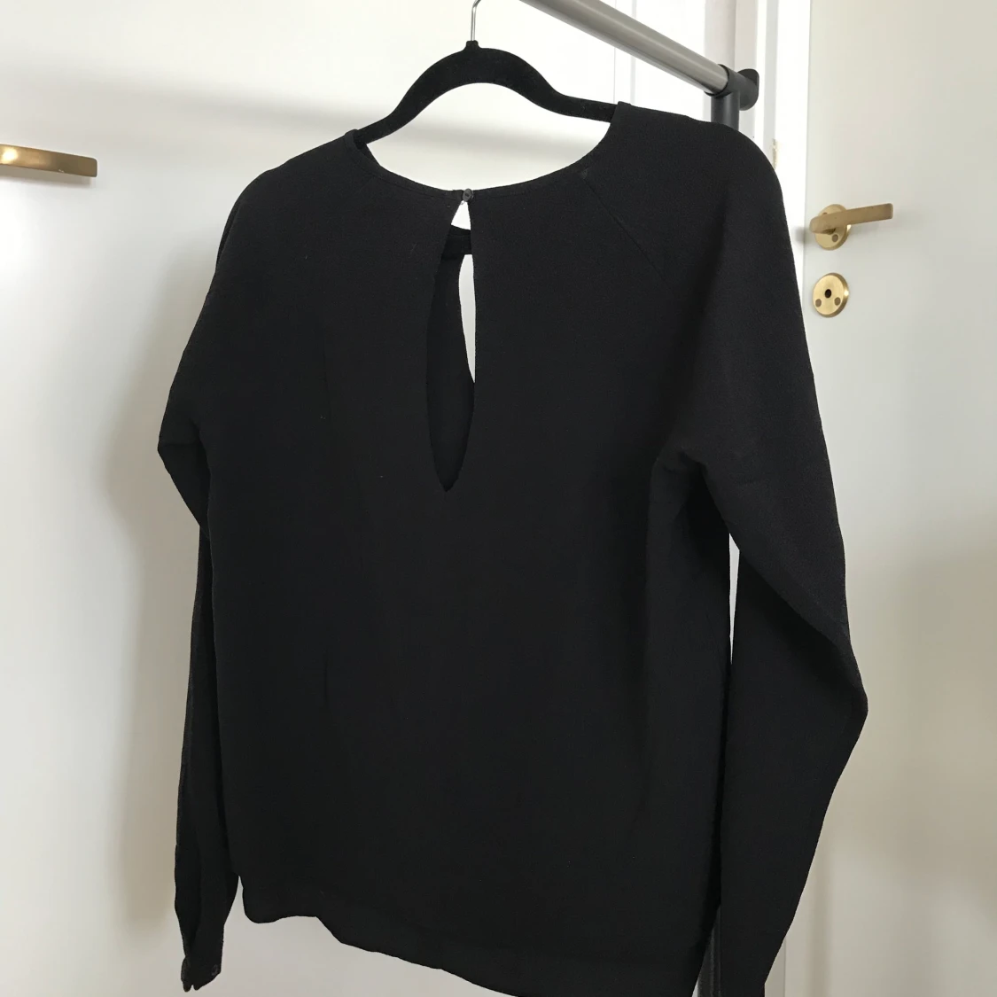 Svart blus storlek 34 - 90