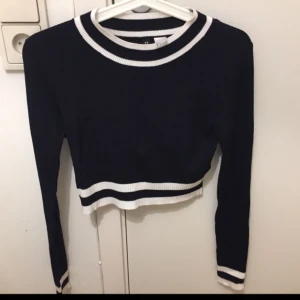  - En Tight magtröja med bra passform. Använt 1 gång. 