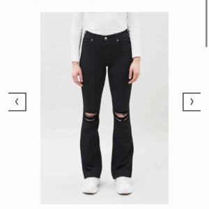  - De denim Bootcut jeans macy. Storlek M/32.