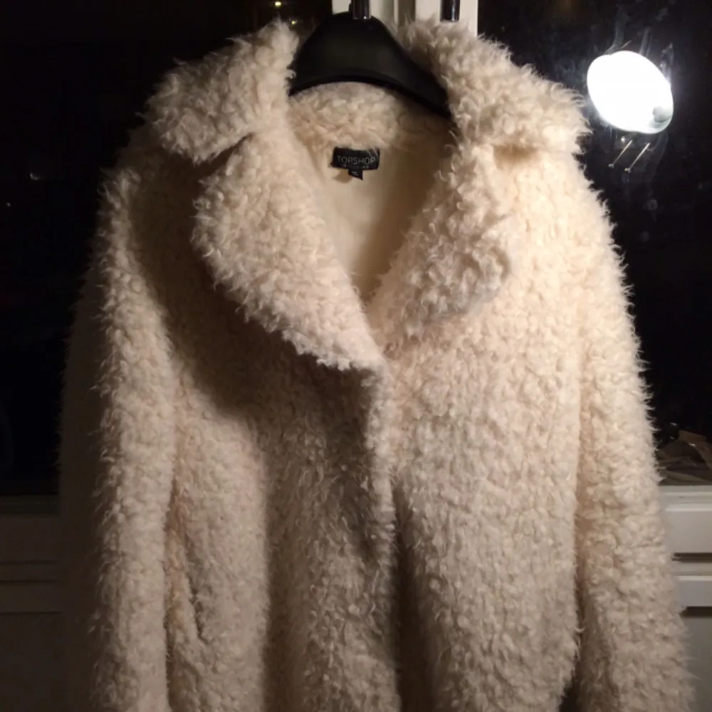 White cozy and warm coat.  Used only a few times.  . Jackor.