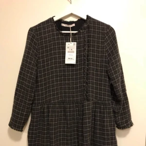  - NEW checked dress in size M. Soft & cozy (viscose & wool) New, with tags. 199 sek ( new price 400)