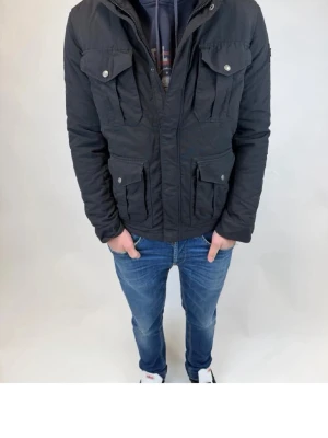 Woolrich fieldjacket - Tja, säljer nu denna woolrich field jacka i superfint skick! Hör av dig vid frågor!