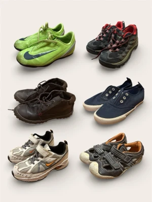 Stort Skopaket (Nike, Columbia, Vincent) – Allt i Strl 31 - Säljer en komplett skogarderob i storlek 31. Här får du allt från tåliga vandringsskor till sommarsandaler och inneskor i ett enda svep. Perfekt för att säkra upp förskole- och skolbehoven! Säljes med fördel som ett extremt prisvärt paket, men kan eventuellt köpas styckvis.  Paketet innehåller (alla i storlek 31):  Columbia: Rejäla mörka vandringsskor/kängor  Nike (Gröna): Inomhusfotbollsskor/gympaskor  Nike (Vita/Grå): Sneakers med smidig kardborre  Vincent: Bruna sommarsandaler  IPS: Bruna hös