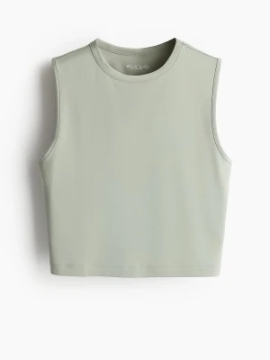 Ljusgrön croppad linnetopp från Move - Snygg ljusgrön croppad linnetopp från H&M Move. Toppen är ärmlös med rund halsringning och har en stilren, minimalistisk design. Perfekt för dig som gillar en enkel men trendig look.