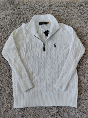 Polo Ralph Lauren Quarter-zip Knit - White Polo Ralph Lauren Quarter- zip Knit. Size S.  MEASUREMENTS:  Height (shoulder - hem) 61cm Sleeve (neck - cuff) 71cm Sleeve (shoulder seam - cuff) 56cm Chest (pit - pit) 50cm Hem 46cm Shoulder (seam to seam) 37cm