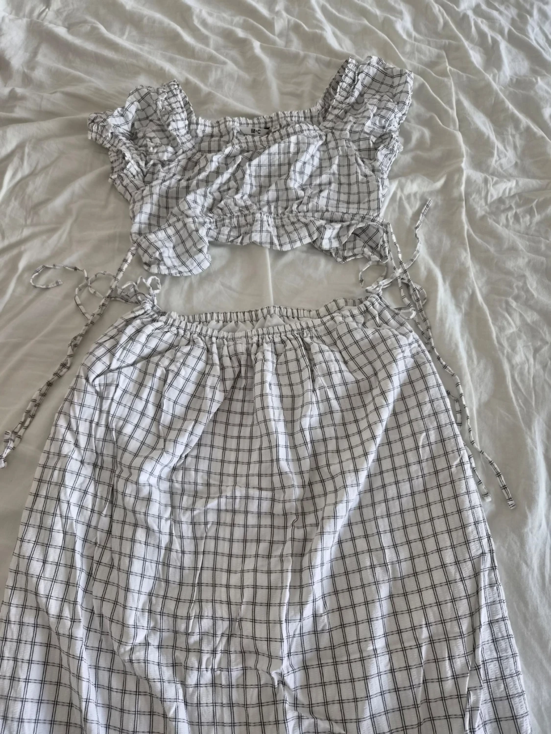 Rutigt set med topp och kjol uniqlo C S