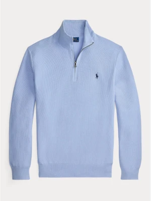 Ljusblå tröja från Polo Ralph Lauren - Ljusblå långärmad tröja från Polo Ralph Lauren med halv dragkedja och klassisk krage. Tröjan har diskret broderad logga på bröstet och är tillverkad i ett mjukt, strukturerat material. Perfekt för en avslappnad och stilren look.