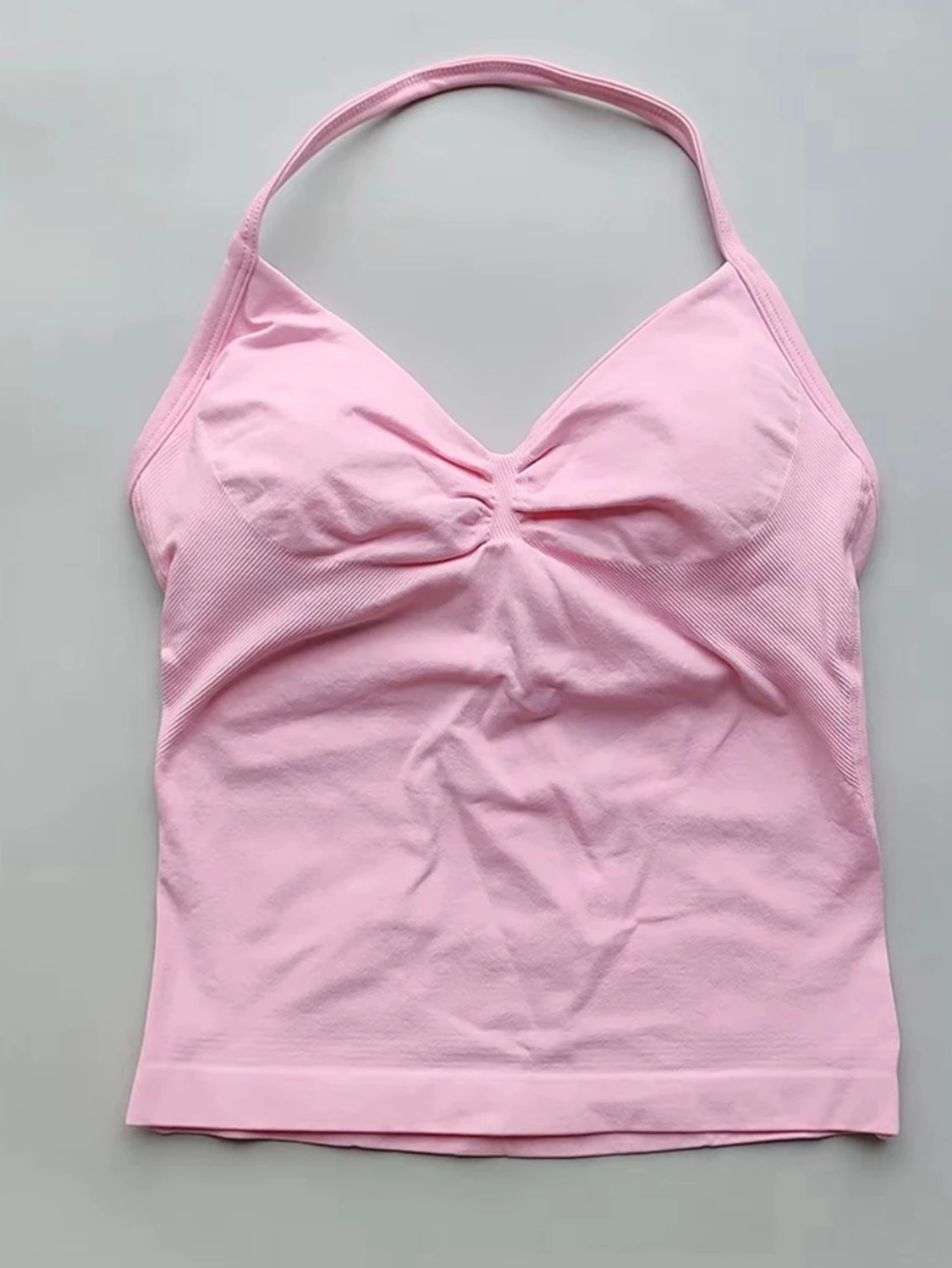 Ljusrosa ärmlös linnetopp