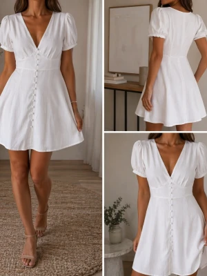 Vit kortklänning med knappar - Söt vit kortklänning med puffärmar och djup v-ringning. Klänningen har dekorativa knappar framtill och en lätt utsvängd form som ger en feminin siluett. Perfekt för sommarens alla tillfällen. Materialet känns lätt och luftigt.