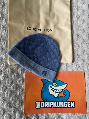 Blå LV Mössa - Blå mössa i ull från Louis Vuitton, Dustbag medföljer 