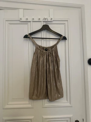 guldlinne y2k - gammal hm från 2000-talet