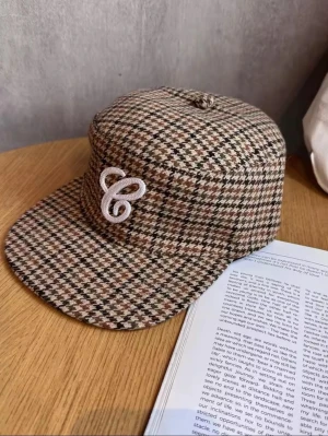 Cool Y2K Keps - Cool Y2K keps i brunt, beige och svart mönster Knappt använd..