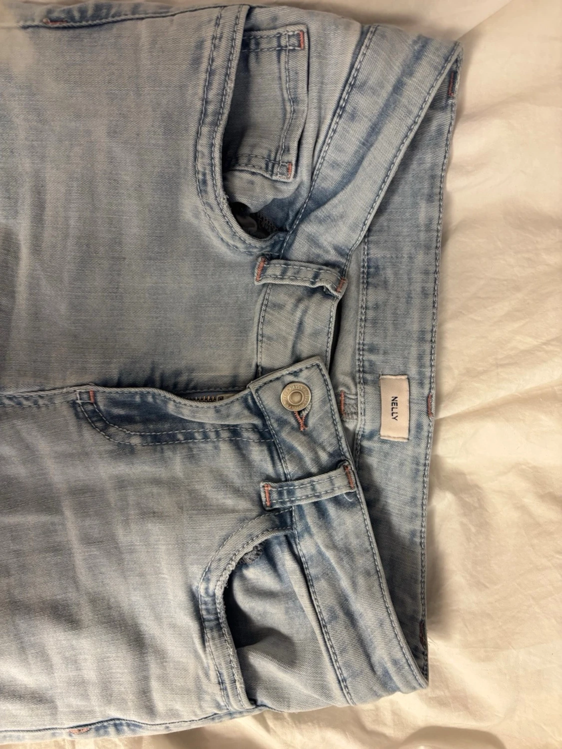 Ljusblå slitna bootcut jeans Nelly - 4