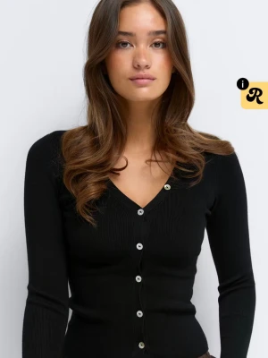 Stickad cardigan  - Helt ny endast testad. 