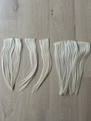 Butterfly weft extensions från BHBD  - Butterfly weft extensions från BHBD 38 cm. Använt i 2 månader. 2 paket.   Från början 50 cm men ”inklipp” för att smälta in med håret.   Nypris 6000kr  Lägger länk till produkten nedan.   https://bhbd.com/sv/products/bhbd-weft-12n-neutral