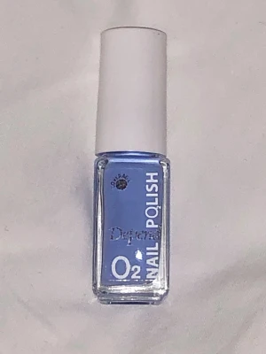 Depend O2 blått nagellack - Snyggt ljusblått nagellack från Depend O2-serien. 5ml. Perfekt skick!