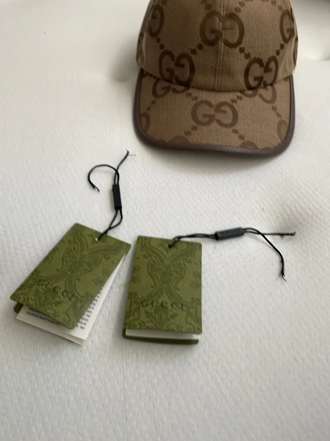 Beige GG keps från Gucci byte Äkta