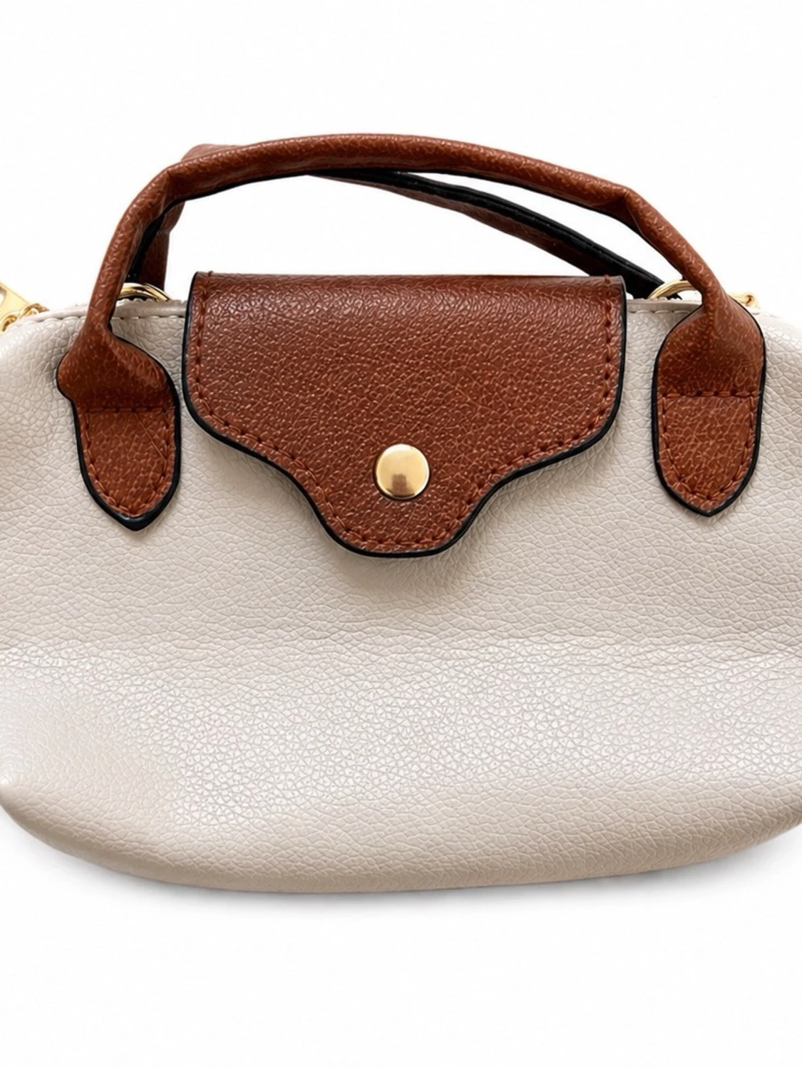 Beige och brun necessär med guldknapp
