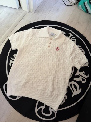 Casablanca white polo t shirt - Size M, true to size. Very comfortable and fits nicely. Brand new