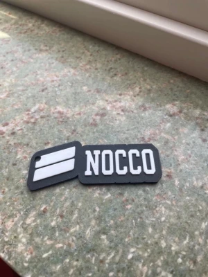 Nocco nyckelring Carbon fiber detalj - Fin Nocco nyckelring med detaljerad carbon fiber, lägg bud