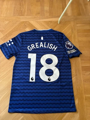 Everton home shirt 25/26 GREALiSH - Säljer denna riktigt snygga Everton hemmatröjan 25/26 med Jack GREALISH på ryggen 