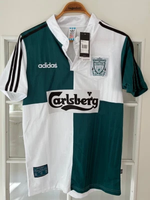 Liverpool Tröja 1995/96 - Helt ny retro Liverpool Carlsberg tröja med prislapp. Storlek M, player version med nummer 9 Ian Rush på ryggen! 