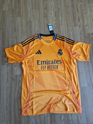 Real Madrid målvaktströja XL - Snygg orange Real Madrid matchtröja storlek XL