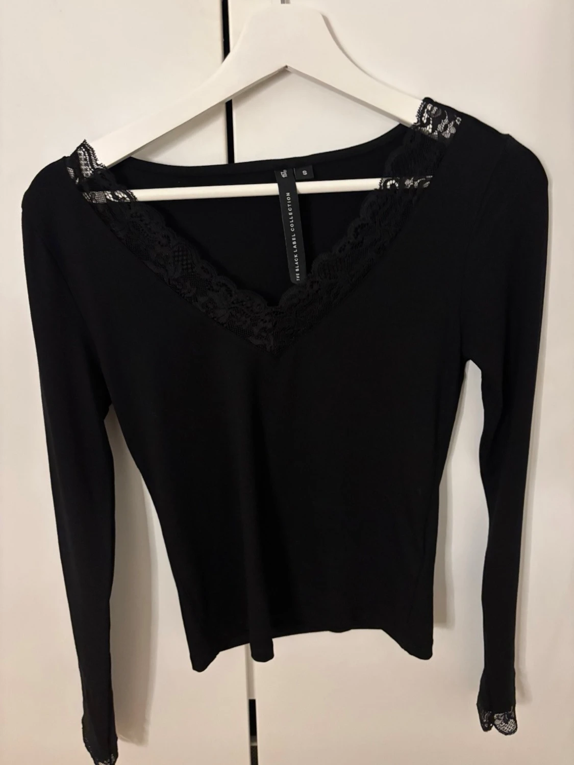 Svart långärmad topp med spets