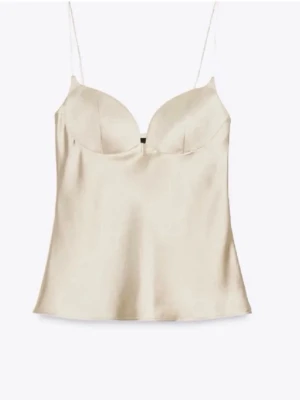 Satin topp Zara - Så fin satin topp från Zara, champagne liknande färg🤍 Aldrig använd då den tyvärr var lite för stor, går inte att köpa längre. Storlek xs Finns en liten reva som var där när jag köpte den, men tycker inte den är synlig, pris kan diskuteras!!